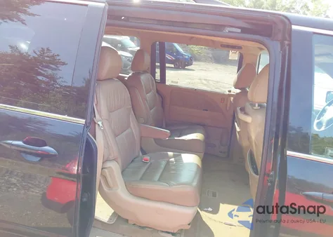 2009 Honda Odyssey Ex-L from USA, damaged, VIN 5FNRL387X9B038710